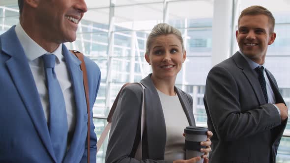 Business people talking in a modern office building