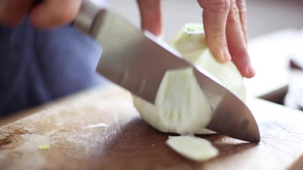 Woman cutting fennel bulb