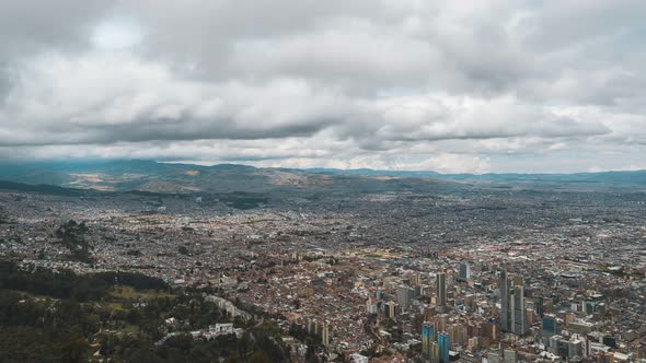 Timelapse of the huge City of Bogota, on top of Monserrate, Colombia during daytime.