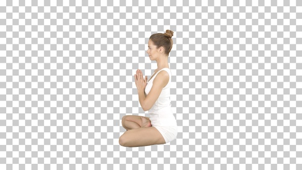 Young caucasian blonde woman practicing yoga, Alpha Channel