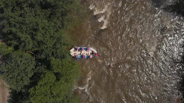 Aerial View of People on Kayak Floating Down the River