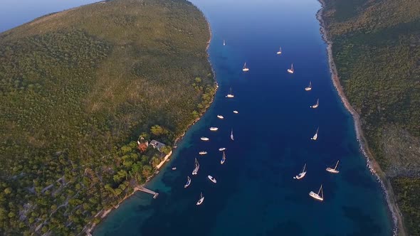 Aerial view of boats anchored at bay during the sunset, Croatia.