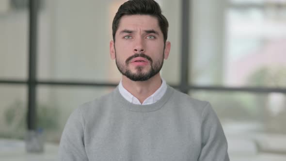 Portrait of Young Man Looking Around Searching