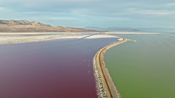 AERIAL - Railroad tracks in Lucin Cutoff, Great Salt Lake, Utah, circle pan