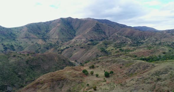 The big mountains and dry land terrain is the panorama of the Dominican Republic border with Haiti