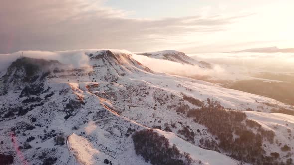 Great Aerial Landscape Mountain View of the Snowy Massive Rock in Sunlight.