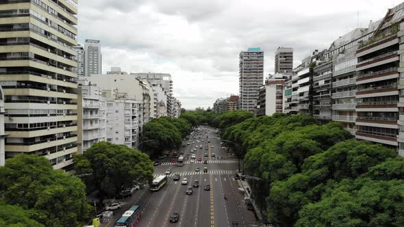 Aerial shot showing many traffic on wide main road avenida del libertador in Buenos Aires,Argentinia