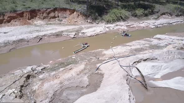 Extraction Equipment Pumps Sand From Shallow River