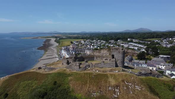 Drone footage of Criccieth Castle on the North Wales Coast in the area of Gwynedd, Wales, UK