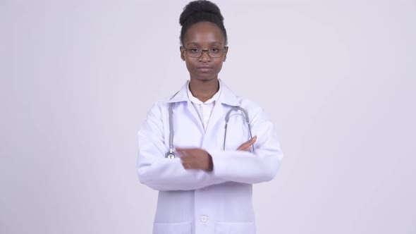 Young Beautiful African Woman Doctor with Arms Crossed