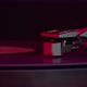 Blue Vinyl Record Spinning on Turntable On Neon Red Light LP Player in Motion - VideoHive Item for Sale