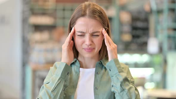 Portrait of Exhausted Woman Having Headache