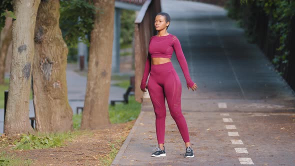 Young African Girl Practicing Fitness Working Out Outdoors
