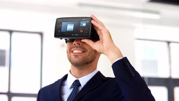 Businessman with Vr Headset and Cube on Screen 104