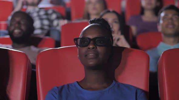 Smiling Black Woman Enjoying Fascinating 3d Film