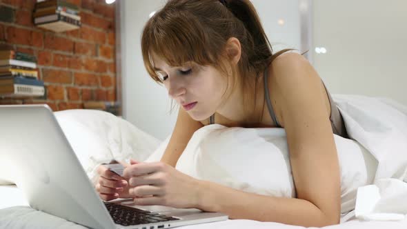 Online Payment Failure, Upset Woman in Bed Trying to Shop Online