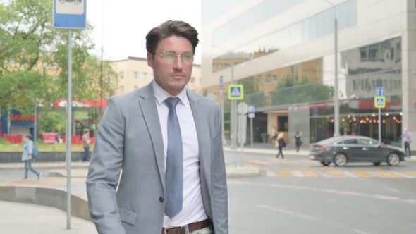 Businessman Walking in Slow Motion