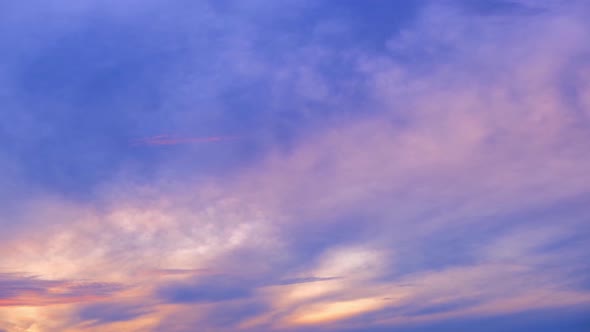 4K Time lapse of colorful sky during beautiful sunrise. Romantic clouds