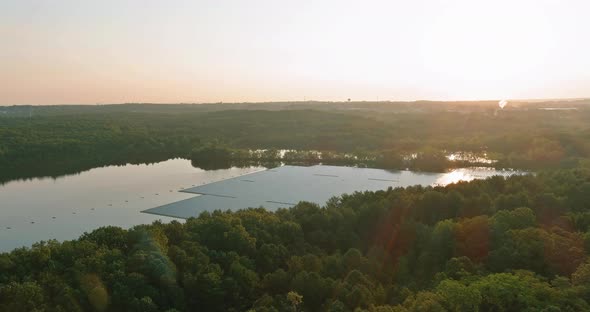 Aerial View of Floating Farm Solar Park Panels on the Water in Pond