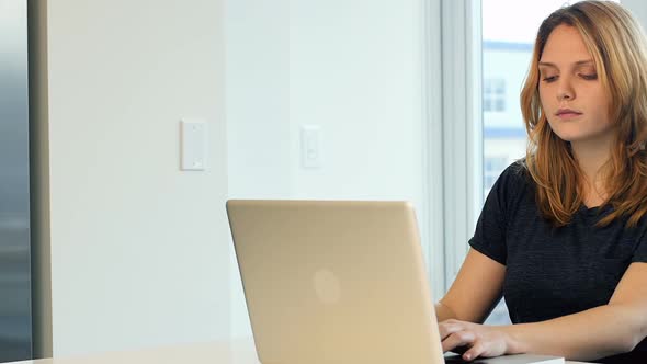 Woman using laptop