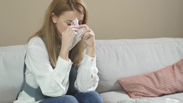 Girl Patient Wipes Tears with Paper Napkin at Family Psychologist's Care