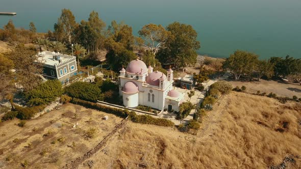 Orthodox Church of the 12 Apostles. Sea of Galilee. Capernaum. Aerial Dolly