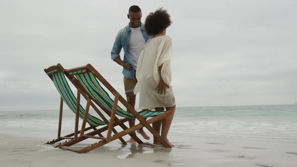 Couple enjoying free time by the sea