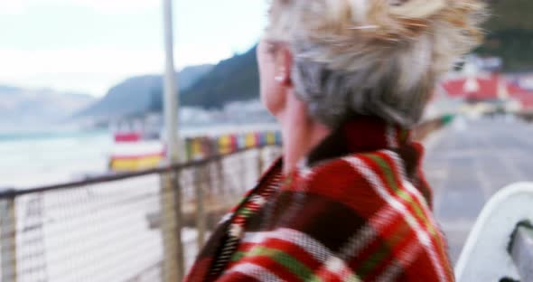 Senior woman enjoying the view at the beach