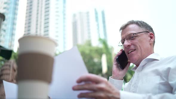 businessman working with data on laptop, concept idea of starting work on a morning in the city