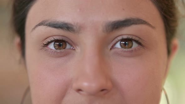 Close Up of Blinking Eyes of Young Indian Woman 