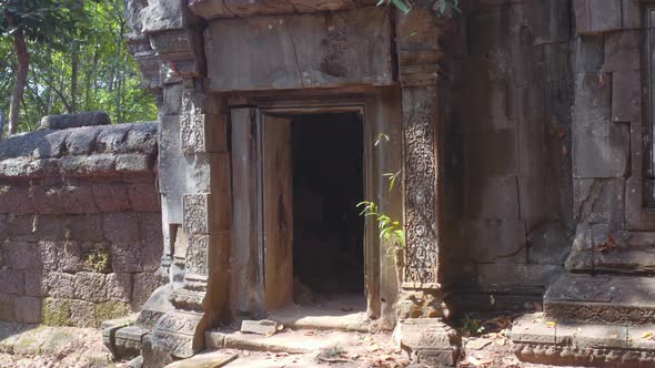 Male Actor Coming Out From a Passage in the Temple