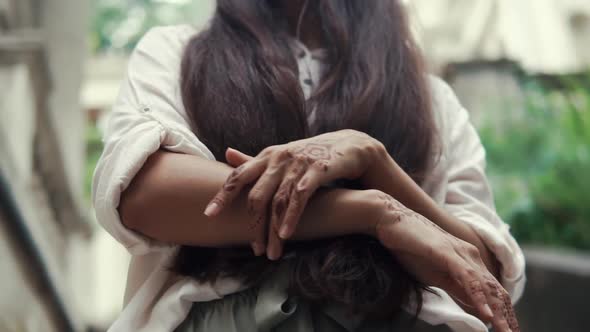 Shot of a Woman's Hands, Who Touches Herself, She Looks Romantic with Tattoos