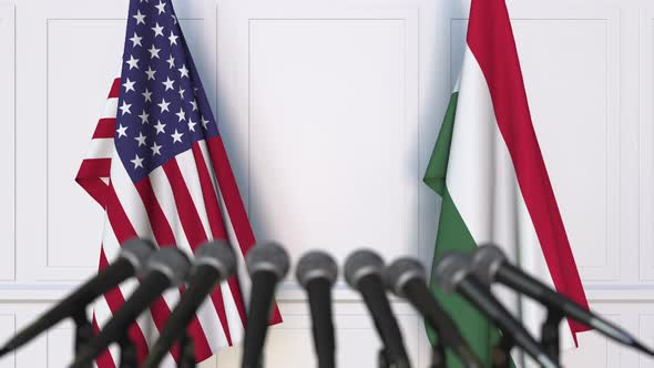 Flags of the United States and Hungary at International Meeting alt