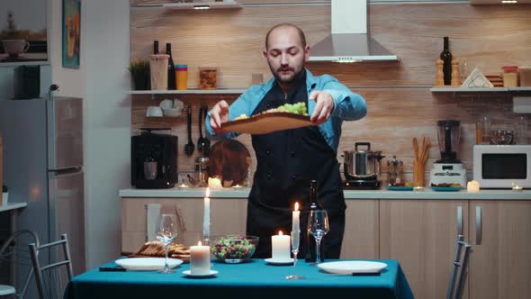 Man Cooking for His Wife