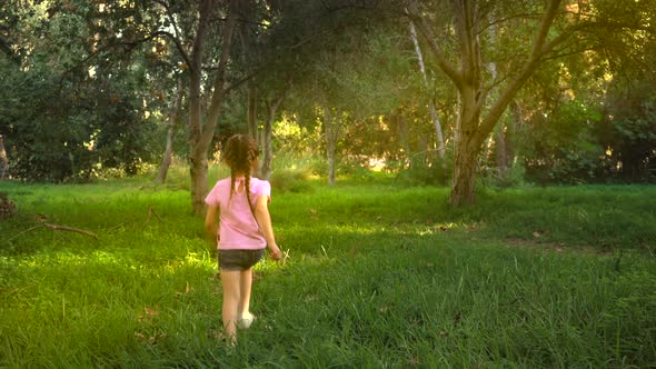 Girl Runs In The Forest