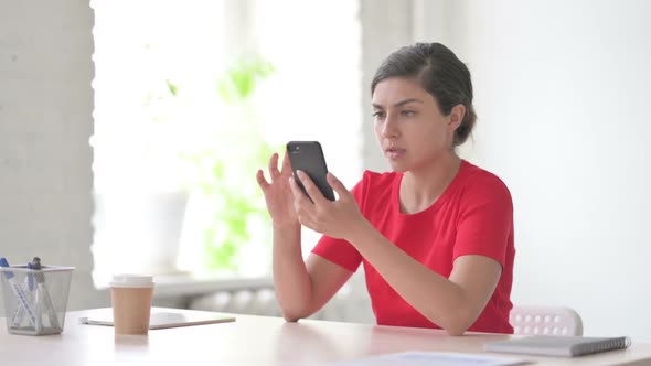 Upset Indian Woman Reacting to Loss on Smartphone