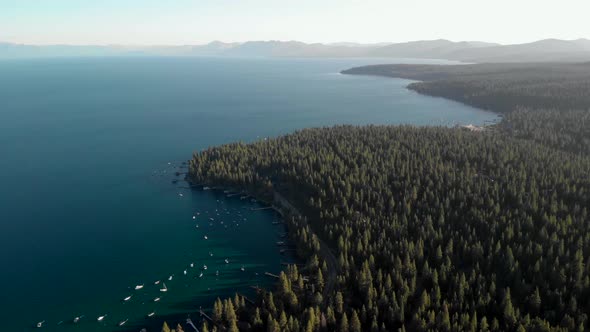 Expansive aerial shot over Lake Tahoe near Dollar Point.