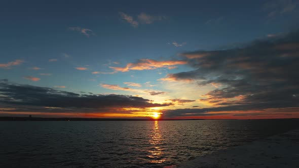 Beautiful Cloudscape Over the Sea Sunset Time Lapse Shot