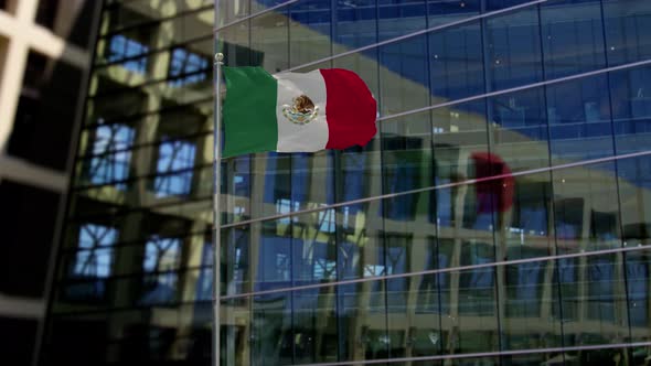 Mexico Flag Waving On A Skyscraper Building