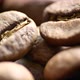 Fragrant coffee beans are roasted in a frying pan.  - VideoHive Item for Sale
