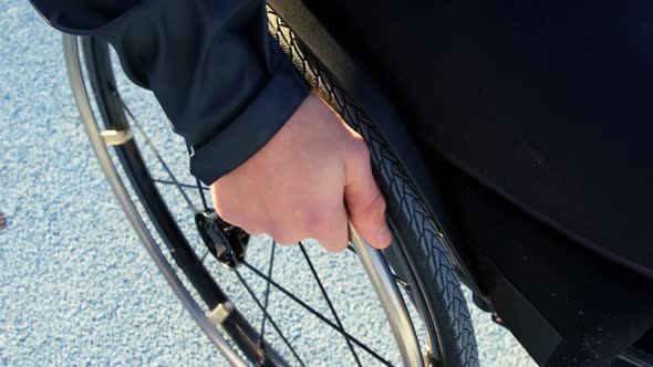 Disabled athletic moving with wheelchair at sports venue 4k