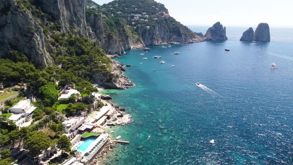 Faraglioni and Capri Coastline From Marina Piccola Aerial View  Italy