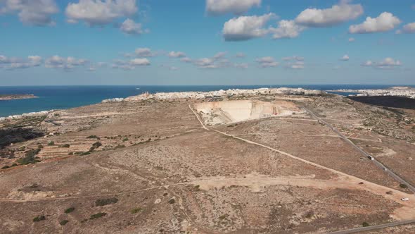 Aerial drone video from northern Malta near the Ghajn Znuber Tower.