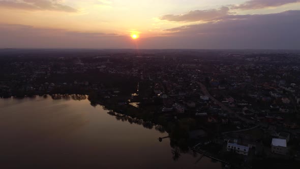 Cityline, Roads And Lake On Sunset