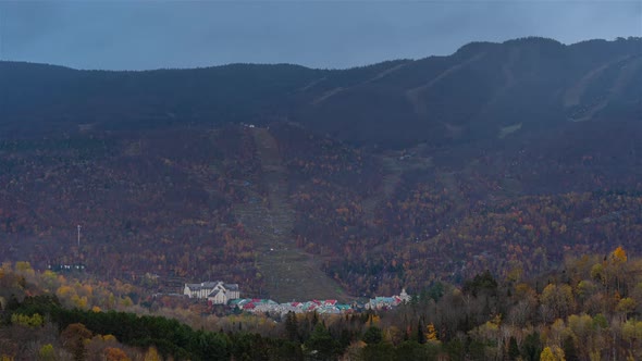 Mont-Tremblant, Canada, Timelapse - The iconic Mont-Tremblant Ski Resort station under the rain