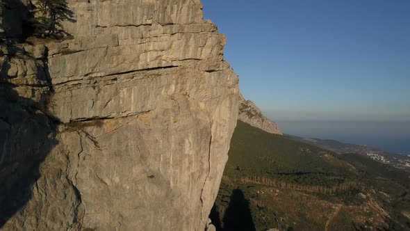 Aerial Shot of Amazing Mountains and Rocks in Crimea. Shaan-Kaja. Flight Close To Huge Cliff Used