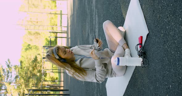 Young Woman Meditating After Outdoor Workout