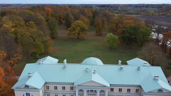 Autumn Aerial Landscape of the City Mezotne and Palace With Park Near Lielupe River, Latvia 4K Video