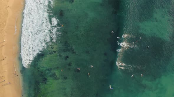 Aerial Drone Flight Over Surfers Beach at Bali Indonesia