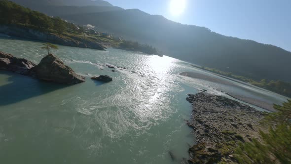 Aerial Panorama View Speed Water Flow Mountain River Cliff Rocky Texture Island and Walking Bridge